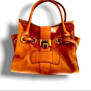 Orange patent leather Jimmy Choo Riki bag